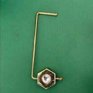 Under-counter Gold Hexagon Purse Hook with Crystal.